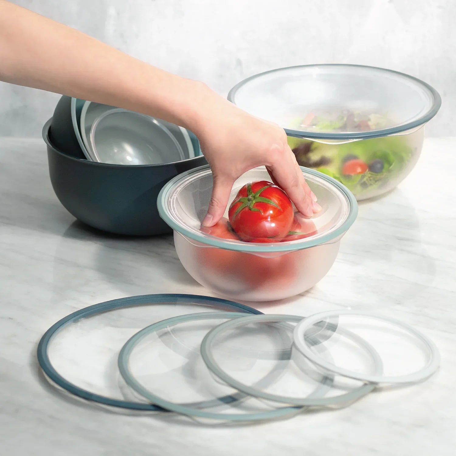 DeliOne FlexiLid reusable silicone lids covering glass containers