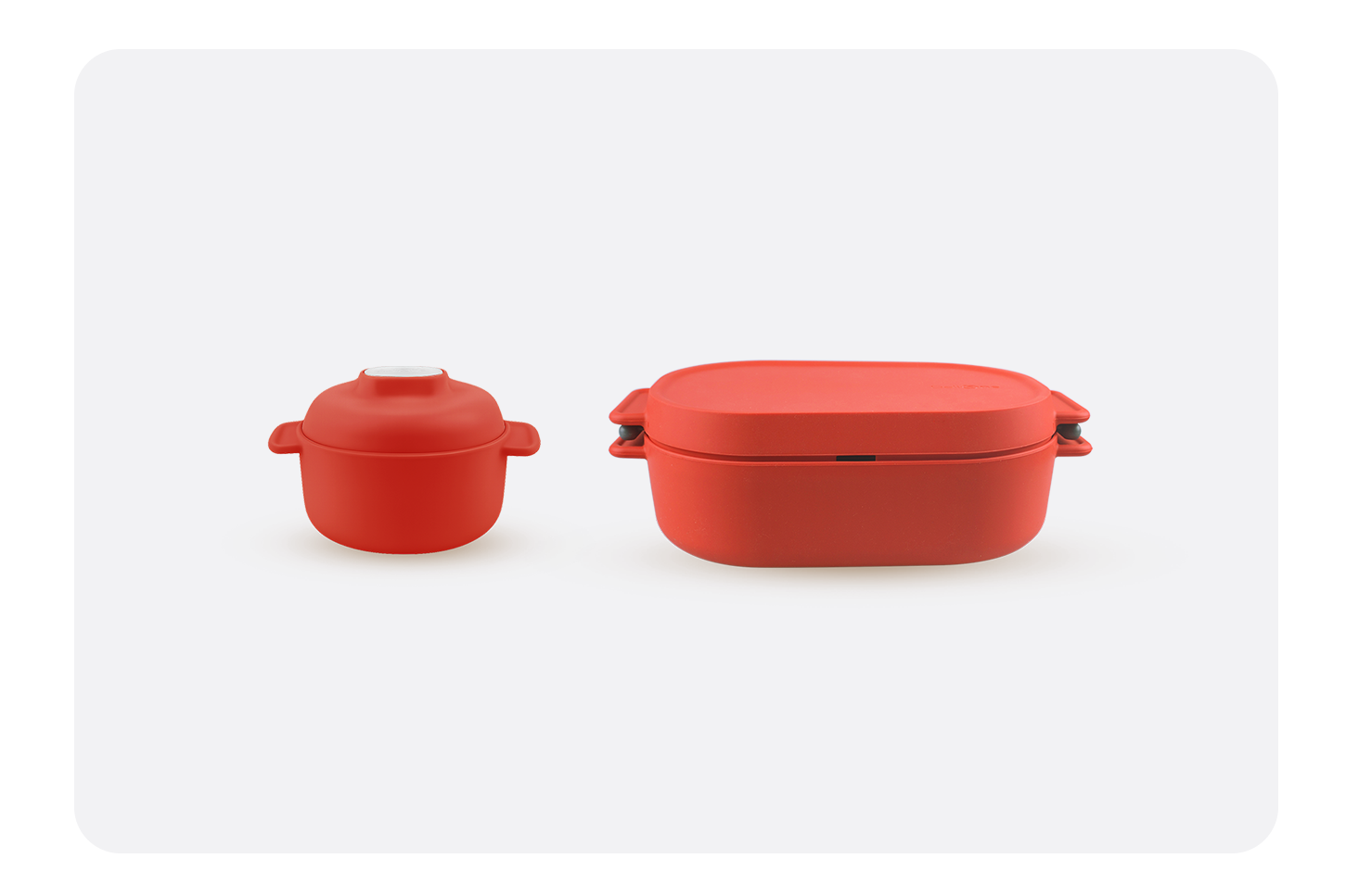 Side profile of a red silicone steam cooker demonstrating its flexible depth