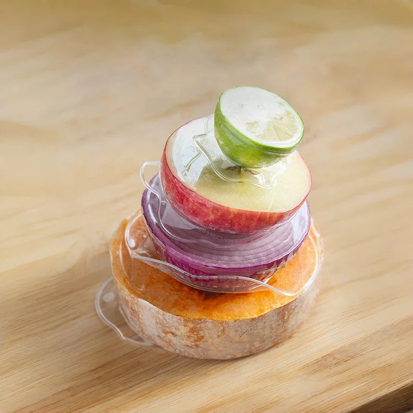 Flex’n Fresh Stretch Lid covering half-cut fruit and vegetables – DeliOne